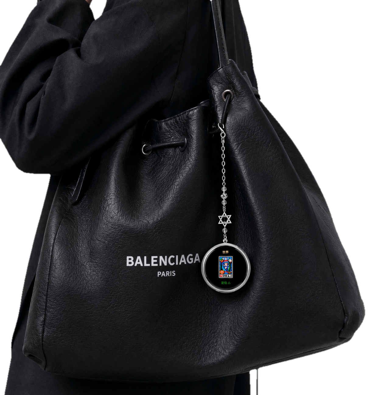FateBadge charm hanging on a bag